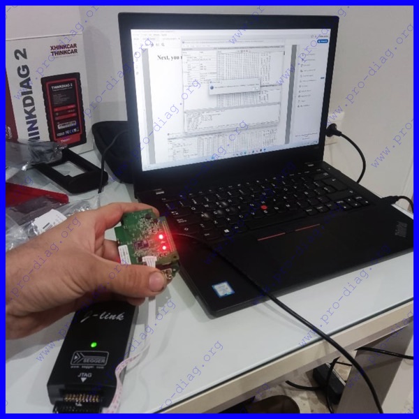 ProDiag flash with boots – programming OBD device on laptop
